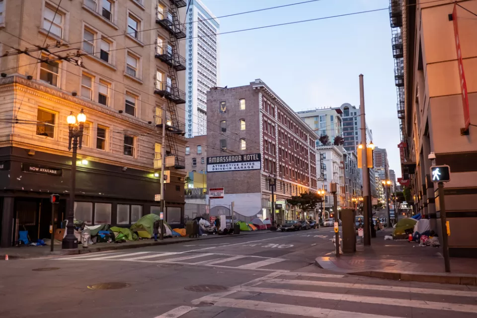 Street in San Francisco's Tenderloin District with tents on sidewalk